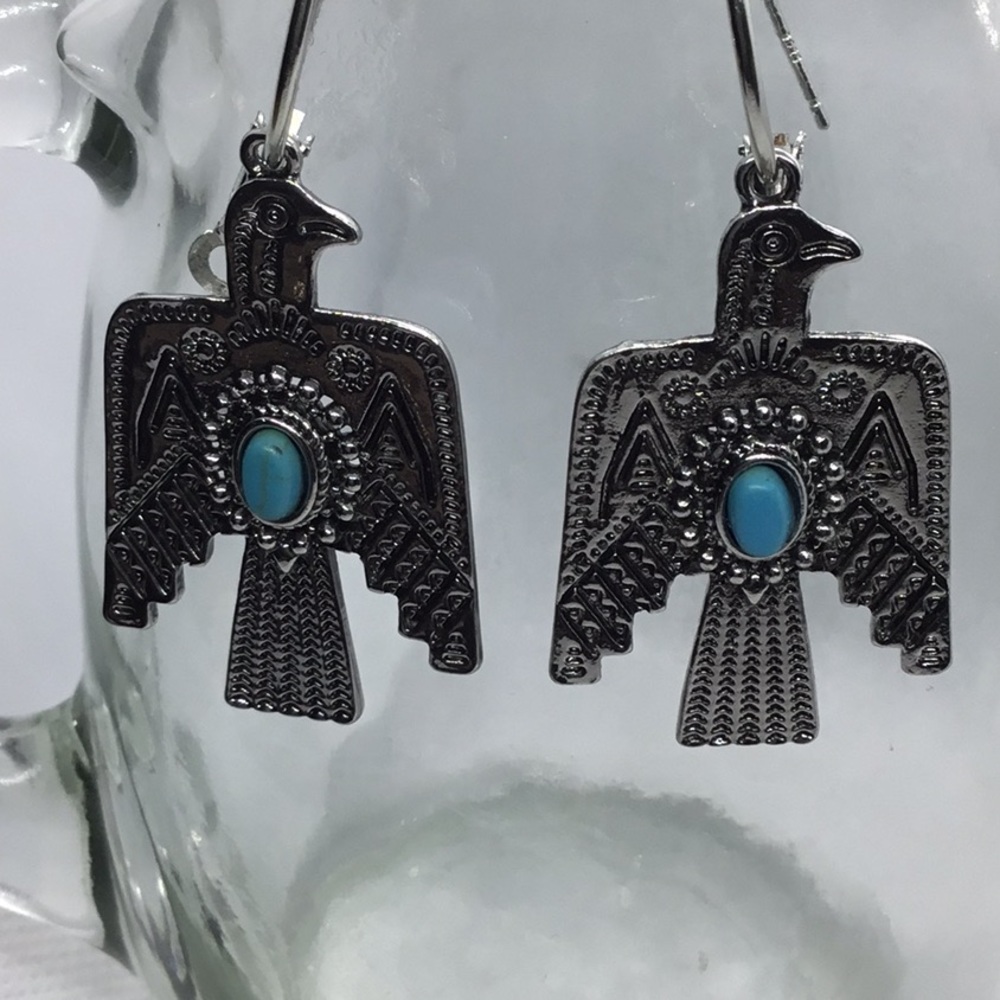 Western style Silver Tone Eagle Earrings accented with Turquoise Color Stone